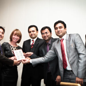 Representatives from iBus accept an Honorable Mention for Indore, India