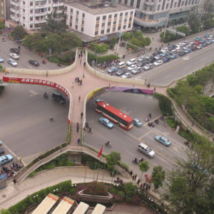 Traffic waiting for light to change under pedestrian bridge_Kunming_March2011_MK