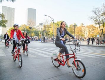 itdp climate week event image - women riding Ecobici bikes in Mexico City